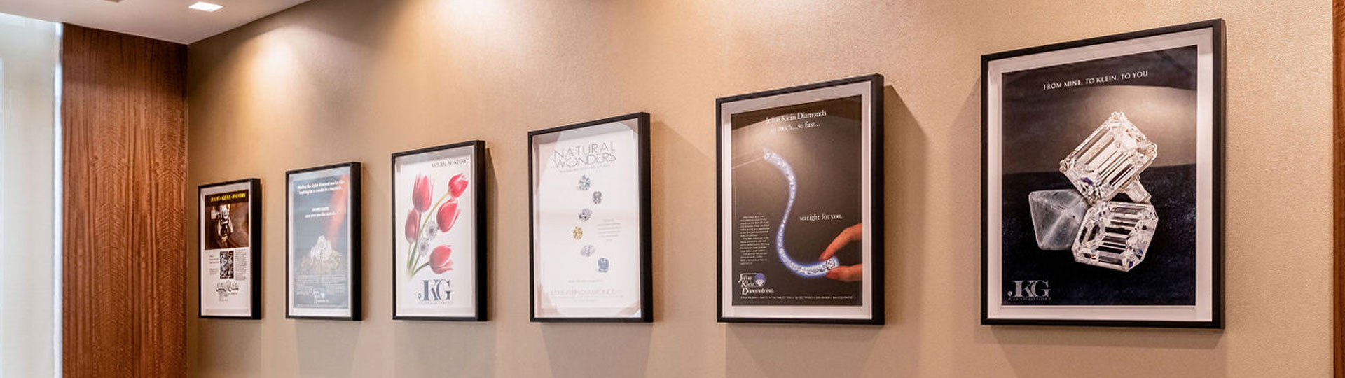 A wall of framed achievements